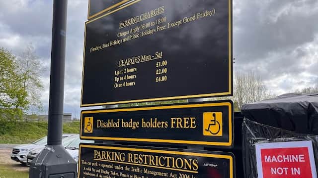 Welcome sign for Friarwood Car Park with parking charges, restrictions, and disabled badge holder information.