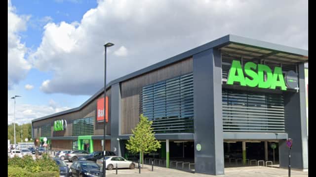 Pay & Display parking area outside an ASDA store in Woodhouse, Yorkshire, with cloudy skies and trees nearby.