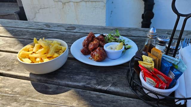 Food & drink at Wainwright's Bar in robin hoods bay