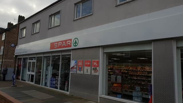 SPAR store exterior on Lowther Street, showcasing large glass windows and a modern facade.