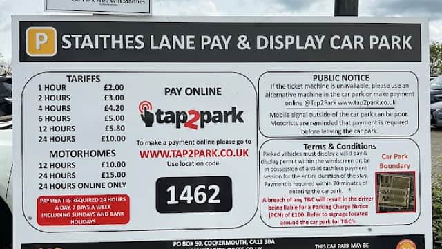 Signage for Staithes Lane Pay & Display Car Park with parking tariffs and payment instructions for tap2park.