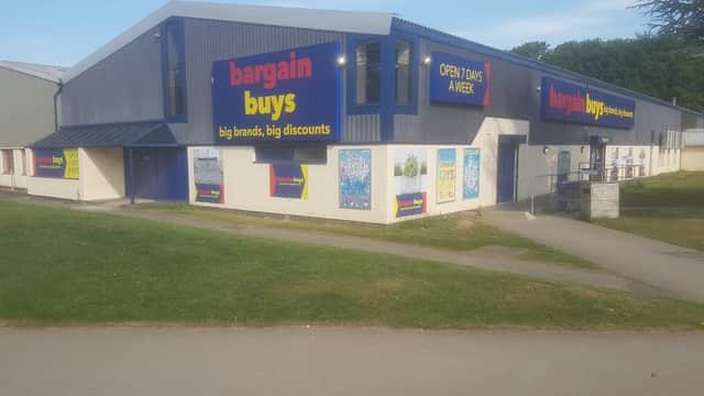Bargain Buys store in Carnaby, Yorkshire, featuring large signage promoting discounts and open days.