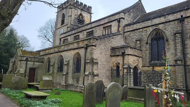 St Mary's Church features a stone exterior, tall tower, stained glass windows, and a graveyard with weathered headstones.