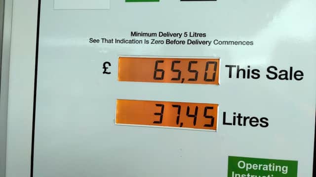Fuel pump display showing £65.50 total sale and 37.45 litres dispensed at Morrisons Daily in Cross Hills, Yorkshire.