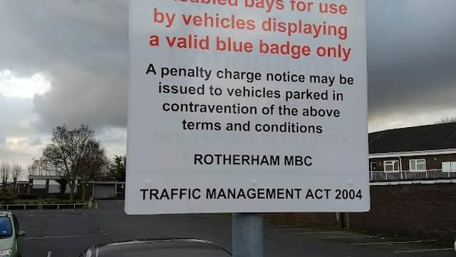 Sign at Queen Street Car Park in Mexborough, detailing parking regulations and disabled bay usage.