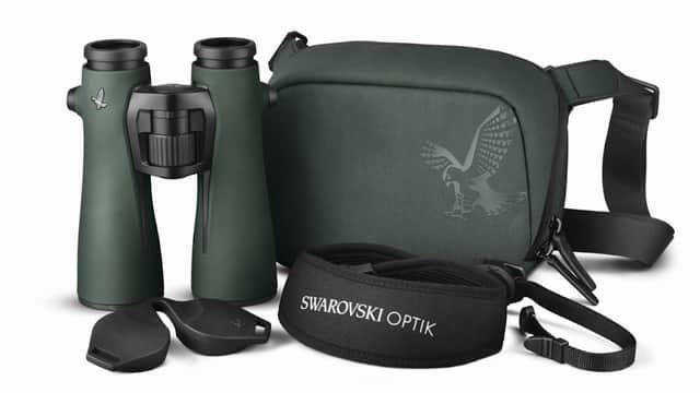 Binoculars with a green casing, carrying case, strap, and lens covers, featuring the Swarovski Optik logo.