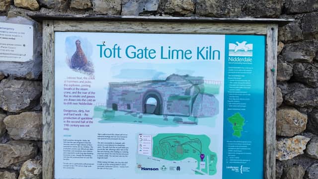 Signboard detailing Toft Gate Lime Kiln, with a stone structure illustration and information about Nidderdale.
