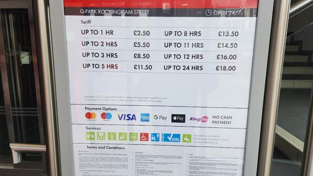Prices and services sign for ParkBee Q-Park in Sheffield, detailing parking tariffs and payment options.