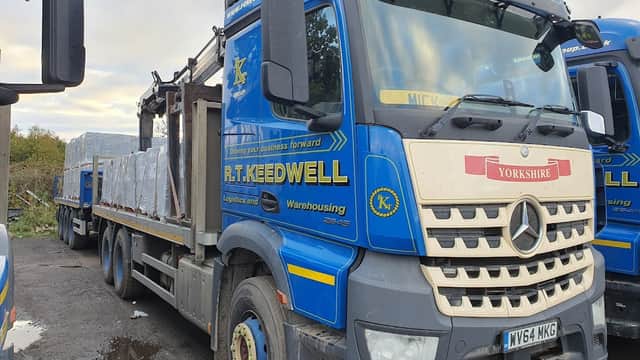 R.T. Keedwell truck parked with cargo, featuring blue and yellow branding, in Hensall, North Yorkshire.