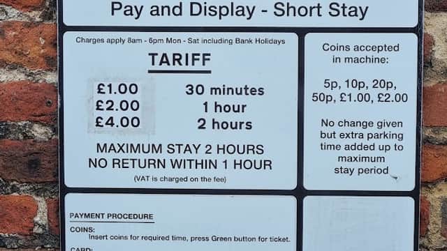 Sign for Butcher Row Car Park in Beverley, detailing parking fees, maximum stay, and payment procedures.