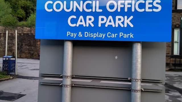 Welcome sign for Council Offices Car Park, featuring "Pay & Display" and Kirklees Council branding in Holme Valley, Yorkshire.
