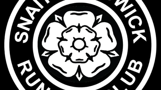 Black circular logo featuring a white rose and the text "Snaith & Cowick Running Club".