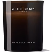 Black Molton Brown candle with "Delicious Rhubarb & Rose" label, sleek design, 190g size.