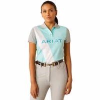 Ariat Women's Taryn Polo in Beach Glass, featuring a diagonal white stripe and gray sleeves, with ARIAT logo on chest.