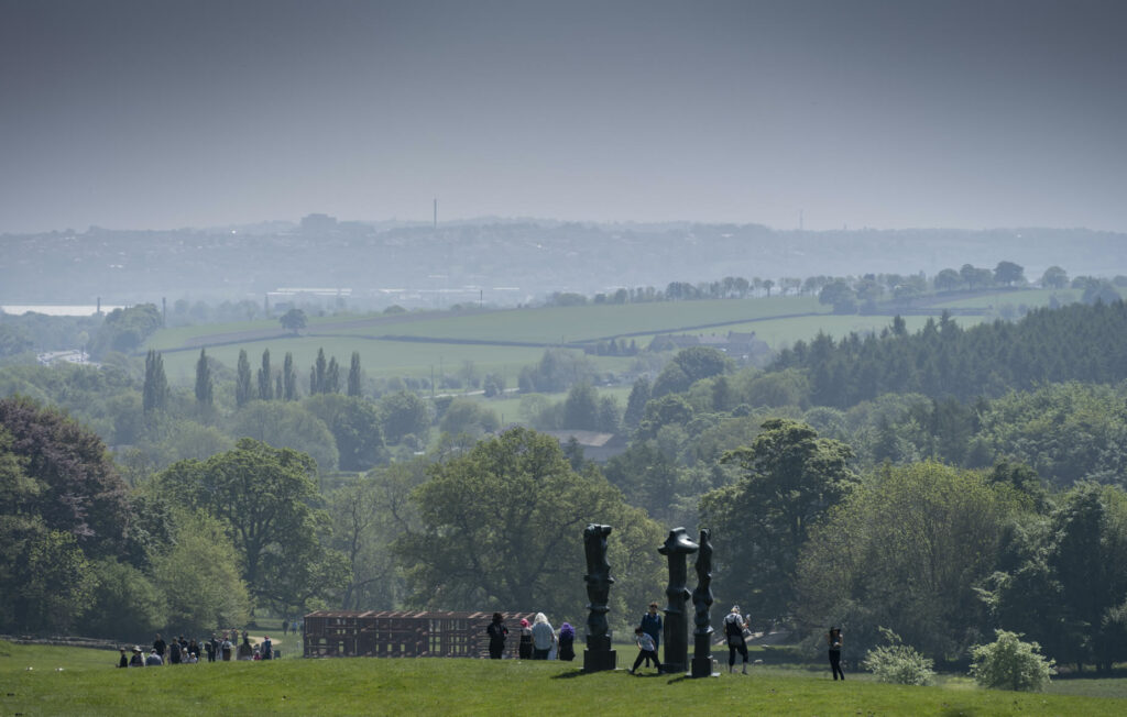 looking down hill to sculptures